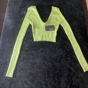 Women’s lime green ribbed knit sweater. Sizes Small, Medium, Large. New